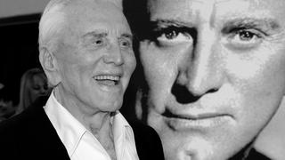 FILE PHOTO: Actor Kirk Douglas arrives to receive an inaugural award for Excellence in film presented by the Santa Barbara International Film Festival at a black-tie gala fundraiser in his honor at the Bacara Resort & Spa in Santa Barbara, California, July 30, 2006. REUTERS/Phil Klein/File Photo