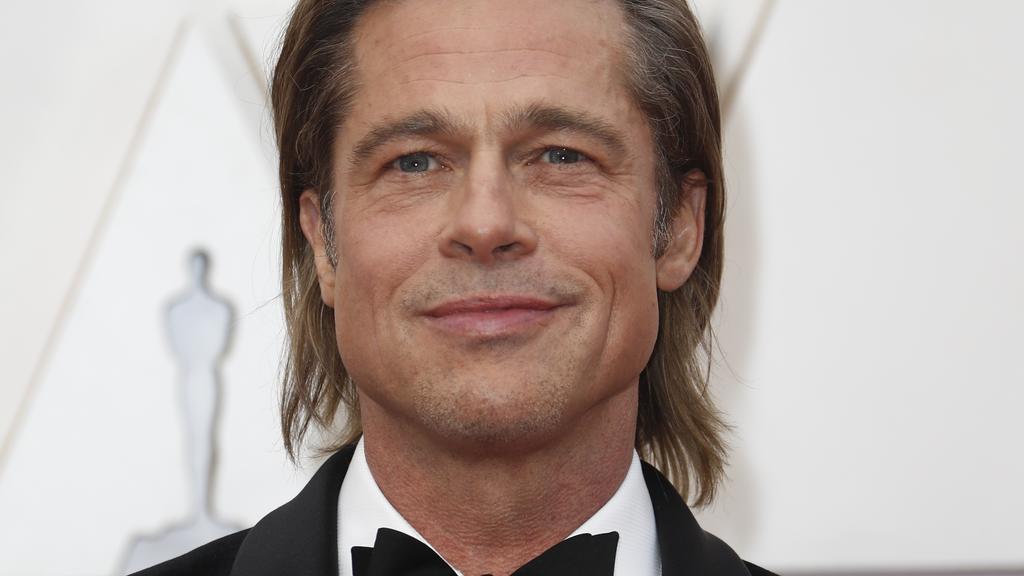 Brad Pitt poses on the red carpet during the Oscars arrivals at the 92nd Academy Awards in Hollywood, Los Angeles, California, U.S., February 9, 2020. REUTERS/Eric Gaillard