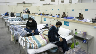 200210 -- WUHAN, Feb. 10, 2020 -- Patients are seen at a temporary hospital converted from Wuhan Livingroom in Wuhan, central China s Hubei Province, Feb. 10, 2020. In face of the outbreak of the novel coronavirus pneumonia epidemic, Wuhan authorities have transformed public venues such as exhibition centers and gymnasiums into temporary hospitals. The hospitals have a large capacity of treating patients with mild symptoms and play an important role in isolating the source of infection and cutting off the routes of infection during epidemic prevention. The first batch of patients was hospitalized on Feb. 5.  CHINA-HUBEI-WUHAN-NCP-TEMPORARY HOSPITAL CN XiongxQi PUBLICATIONxNOTxINxCHN 