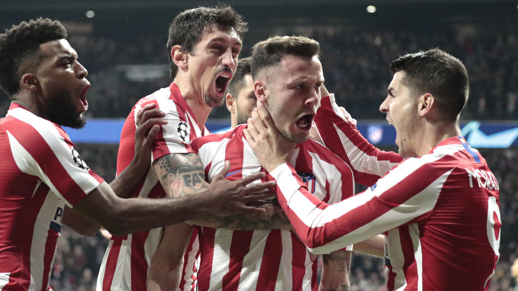 18.02.2020, Spanien, Madrid: Fußball: Champions League, K.o.-Runde, Achtelfinale, Hinspiele, Atletico Madrid - FC Liverpool, Wanda-Metropolitano-Stadion. Saul (2.v.r.) feiert sein Tor mit Teamkollegen. Foto: Bernat Armangue/AP/dpa +++ dpa-Bildfunk ++