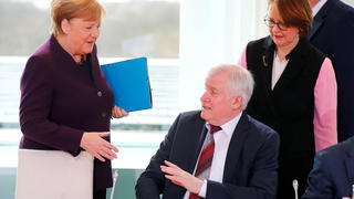 German Interior Minister Horst Seehofer refuses to shake the hand of German Chancellor Angela Merkel for hygienic reasons before a migration summit at the Chancellery in Berlin, Germany, March 2, 2020. REUTERS/Hannibal Hanschke     TPX IMAGES OF THE DAY