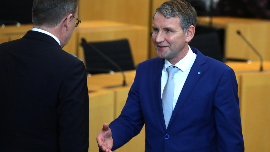 Bodo Ramelow of the Left Party (Die Linke) refuses a handshake from Alternative for Germany (AfD) regional party leader Bjoern Hoecke after he was elected and sworn in as new state prime minister at the Thuringia state parliament in Erfurt, Germany,