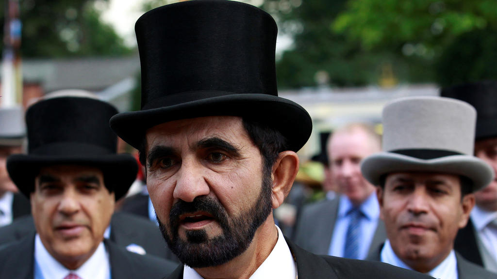 FILE PHOTO: Dubai ruler Sheikh Mohammed bin Rashid al-Maktoum arrives for Ladies Day, the third day of racing at Royal Ascot in southern England June 16, 2011. REUTERS/Suzanne Plunkett/File Photo