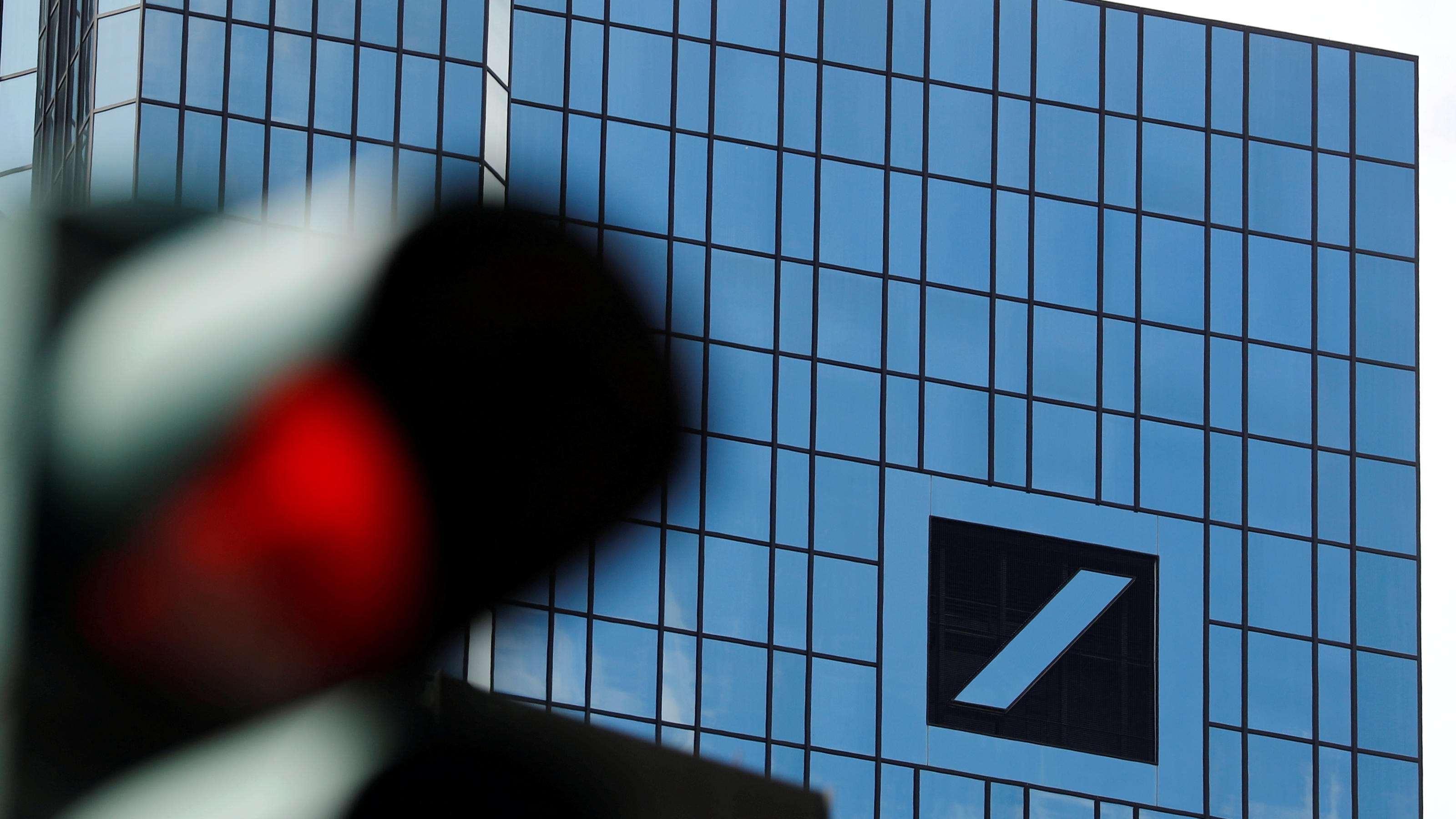 FILE PHOTO: The headquarters of Germany's Deutsche Bank are photographed in Frankfurt, Germany, July 8, 2019.   REUTERS/Kai Pfaffenbach/File Photo