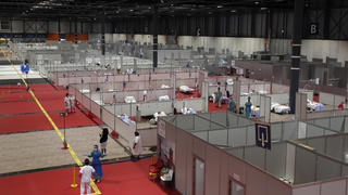 A general view a temporary field hospital set at Ifema convention and exhibition of in Madrid, Spain, Thursday, April 2, 2020. The new coronavirus causes mild or moderate symptoms for most people, but for some, especially older adults and people with existing health problems, it can cause more severe illness or death. (AP Photo/Manu Fernandez)