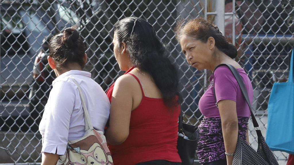 March 10, 2020, Lima, Peru: A woman wears a protective face masks outside national Edgardo Rebagliati hospital in Lima Lima Peru - ZUMAb195 20200310zipb195002 Copyright: xMarianaxBazox