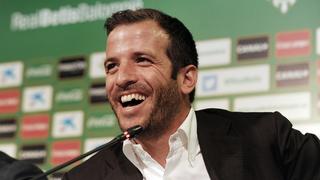 Betis's new signing international Dutch Rafael Van der Vaart smiles during his presentation press conference, at the Benito Villamarin stadium in Sevilla on June 16, 2015. The Dutch midfielder Rafael van der Vaart, once at Real Madrid, has signed on for three seasons at Real Betis from Hamburg, the Andalusian club announced yesterday.  AFP PHOTO / CRISTINA QUICLER        (Photo credit should read CRISTINA QUICLER/AFP/Getty Images)