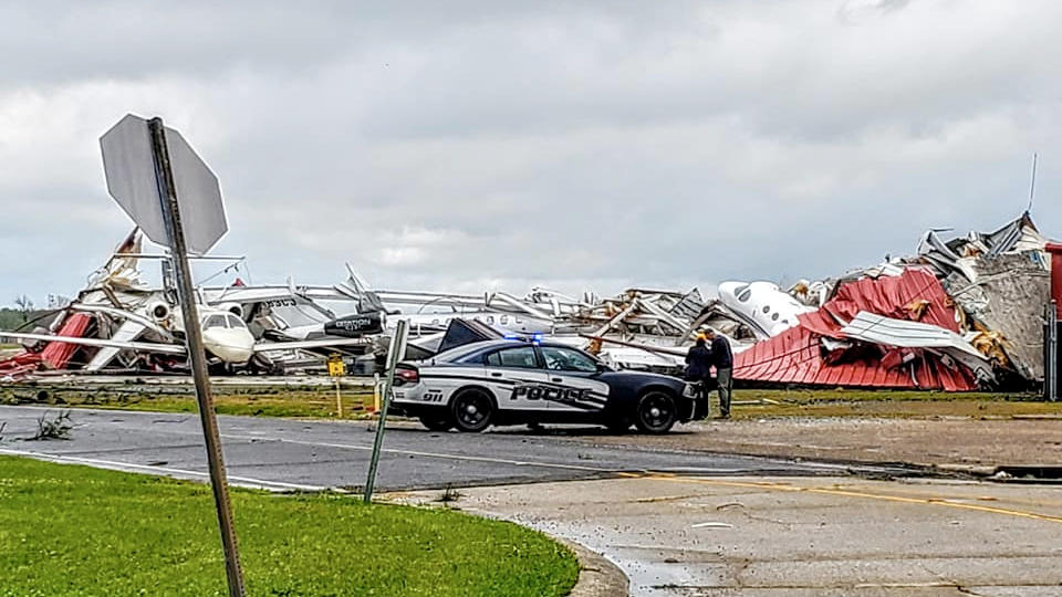 Damaged planes and buildings are seen in the aftermath of a tornado in Monroe, Louisiana, U.S. April 12, 2020, in this still image obtained from social media. Courtesy of Peter Tuberville/Social Media via REUTERS. ATTENTION EDITORS - THIS IMAGE HAS B