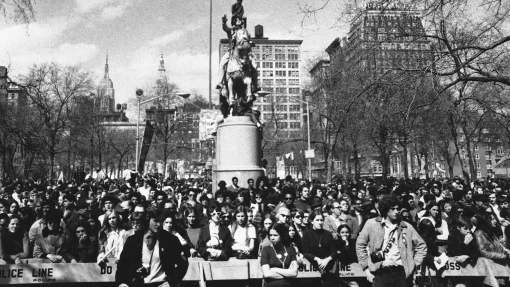 FILE - In this April 22, 1970 file photo, hundreds listen to Earth Day speakers after cleaning up New York's Union Square Park. (AP Photo)