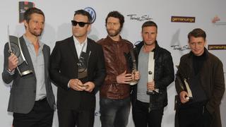 The Band Take That poses with its 2011 Echo Music Award in the category "Best Group International" at the 20th Echo Awards ceremony in Berlin, Germany, 24 March 2011. The Echo Music Award is presented in 25 categories. Photo: Joerg Carstensen dpa/lbn  +++(c) dpa - Bildfunk+++