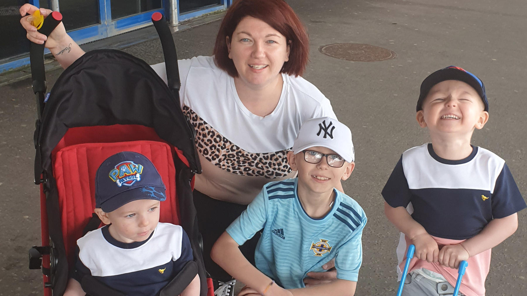 PIC BY CATERS NEWS (PICTURED Danielle Martin, 32, with her three sons Jaiden 9, Parker, 3, and Joshua, 2) A mother-of-three discovered she was pregnant with twins after waking up from an induced coma whilst battling COVID-19. Danielle Martin, 32, ini