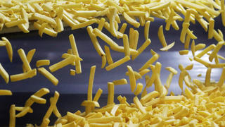 Fresh french fries are seen at Mydibel Group factory, a manufacturer of chilled, frozen and dehydrated potato products, amid the coronavirus disease (COVID-19) outbreak, in Moucron, Belgium April 29, 2020. REUTERS/Yves Herman