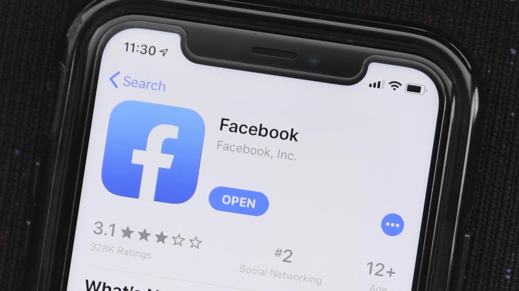 FILE - In this July 30, 2019, file photo, the social media application, Facebook is displayed on Apple's App Store in Chicago, Ill. The social media company said Thursday, April 16, 2020, it is now going to let users know if they liked, reacted or