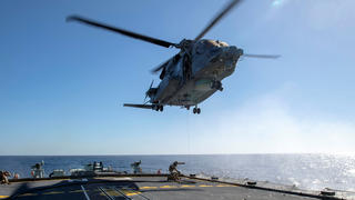 Air detachment members aboard HMCS Fredericton attach a fueling hose on the hoist cable of a CH-148 Cyclone helicopter during Operation Reassurance at sea February 15, 2020, in this picture obtained from social media. Picture taken February 15, 2020. Mandatory credit CORPORAL SIMON ARCAND - CANADIAN ARMED FORCES/via REUTERS THIS IMAGE HAS BEEN SUPPLIED BY A THIRD PARTY. MANDATORY CREDIT.
