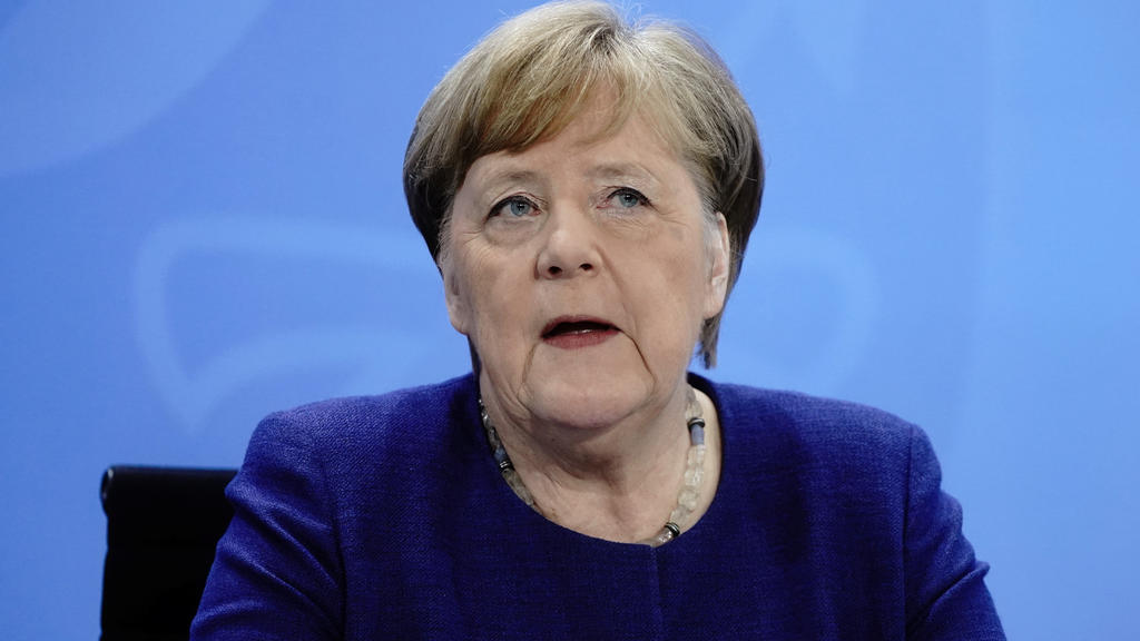 German Chancellor Angela Merkel attends a news conference after discussing with German state premiers corona measures amidst a discussion on whether the regulations need relaxing or not at the Chancellery in Berlin, Germany, April 15, 2020, as the sp