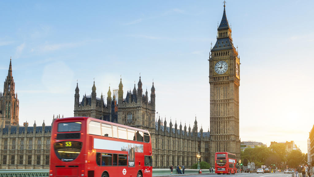 London, United Kingdom - August 20, 2016: Westminster palace and Big Ben and traffic on Westminster bridge in foreground