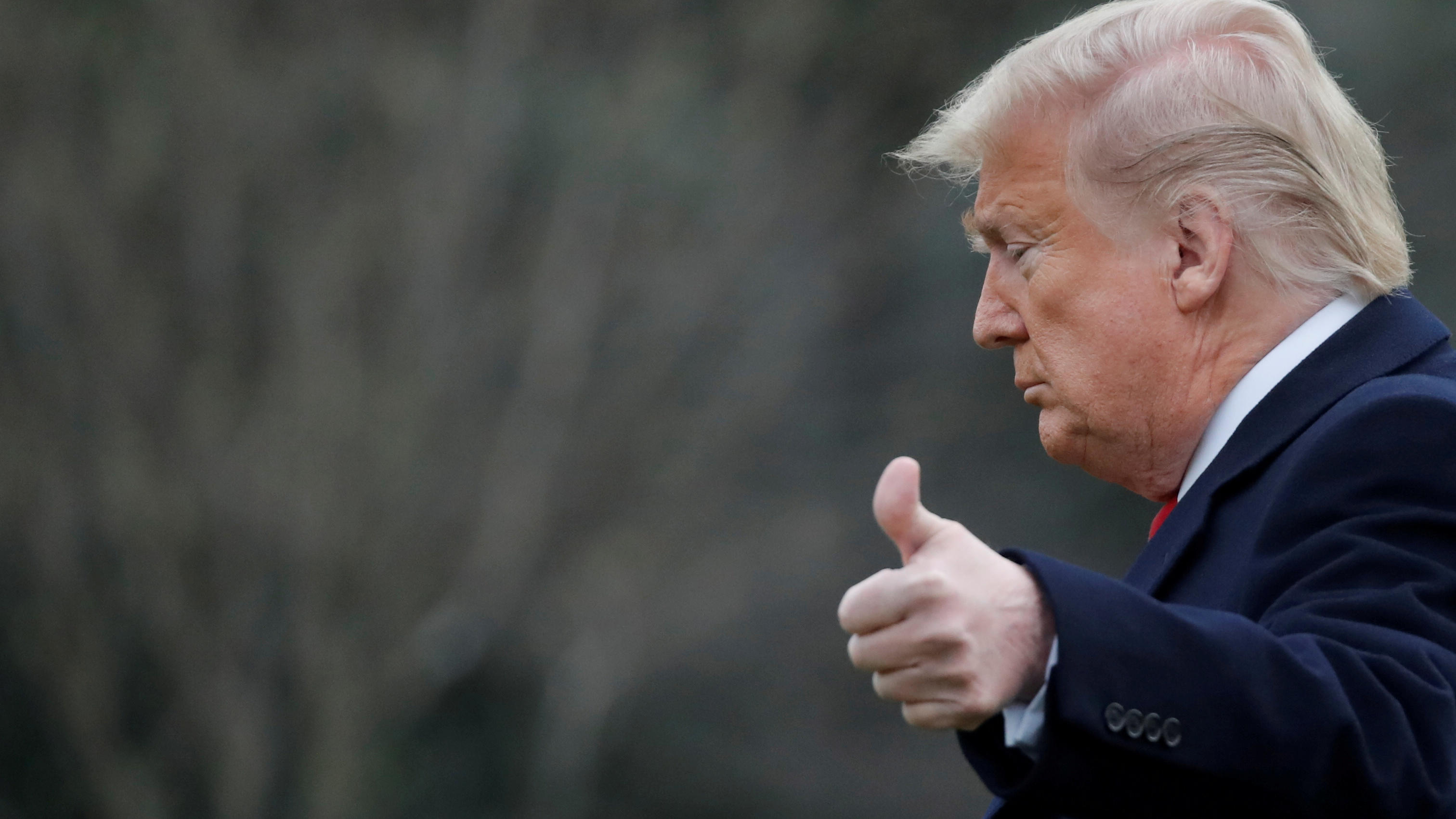 FILE PHOTO: U.S. President Donald Trump gestures to reporters as he departs for travel to Scranton, Pennsylvania from the South Lawn of the White House in Washington, U.S.,  March 5, 2020. REUTERS/Carlos Barria/File Photo