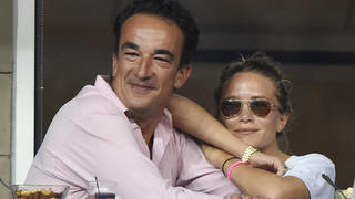 FLUSHING NY- SEPTEMBER 01: Olivier Sarkozy and Mary Kate Olsen are sighted watching Victoria Azaranka defeat Alexandrk Kurnic on Day eight of the 2014 US Open at the USTA Billie Jean King National Tennis Center . Olivier Sarkozy is a French banker based in the United States. His half-brother is Nicolas Sarkozy, former President of France on September 1, 2014 in the Flushing neighborhood of the Queens borough of New York City..People: Olivier Sarkozy, Mary Kate Olsen. Flushing Queens United States Of America - ZUMAs214 20140901zbas214004 Copyright: xSMGx
