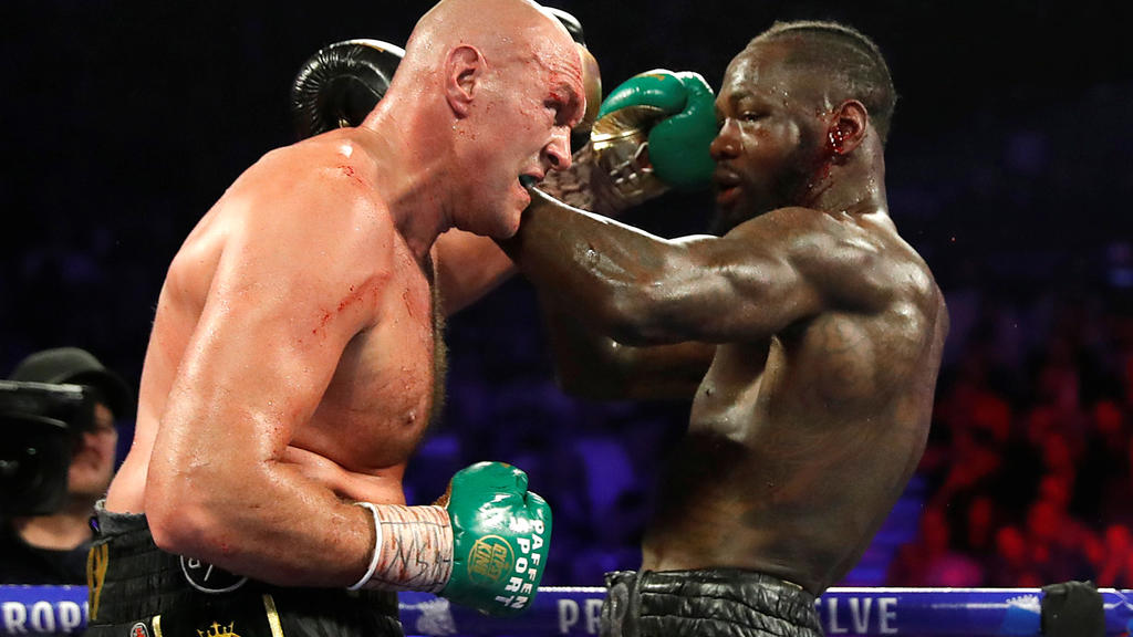 FILE PHOTO: Boxing - Deontay Wilder v Tyson Fury - WBC Heavyweight Title - The Grand Garden Arena at MGM Grand, Las Vegas, United States - February 22, 2020 Tyson Fury in action against Deontay Wilder REUTERS/Steve Marcus/File Photo