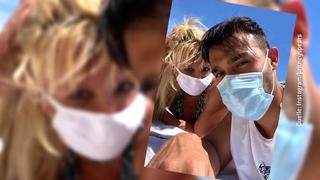 Britney Spears und ihr Freund  Sam Asghar tragen Mundschutz beim Sonnenbaden.