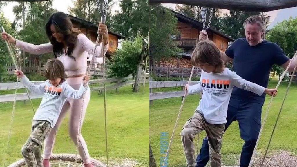 Verona und ihr Mann Franjo Pooth schaukeln im Urlaub mit Söhnchen Rocco.