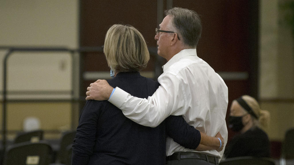 Gay and Bob Hardwick who were attacked in their Stockton home in 1978 by Golden State Killer, Joseph James DeAngelo, stand as the charges are read against DeAngelo during a hearing in Sacramento Superior Court in Sacramento, Calif. Monday June 29, 20
