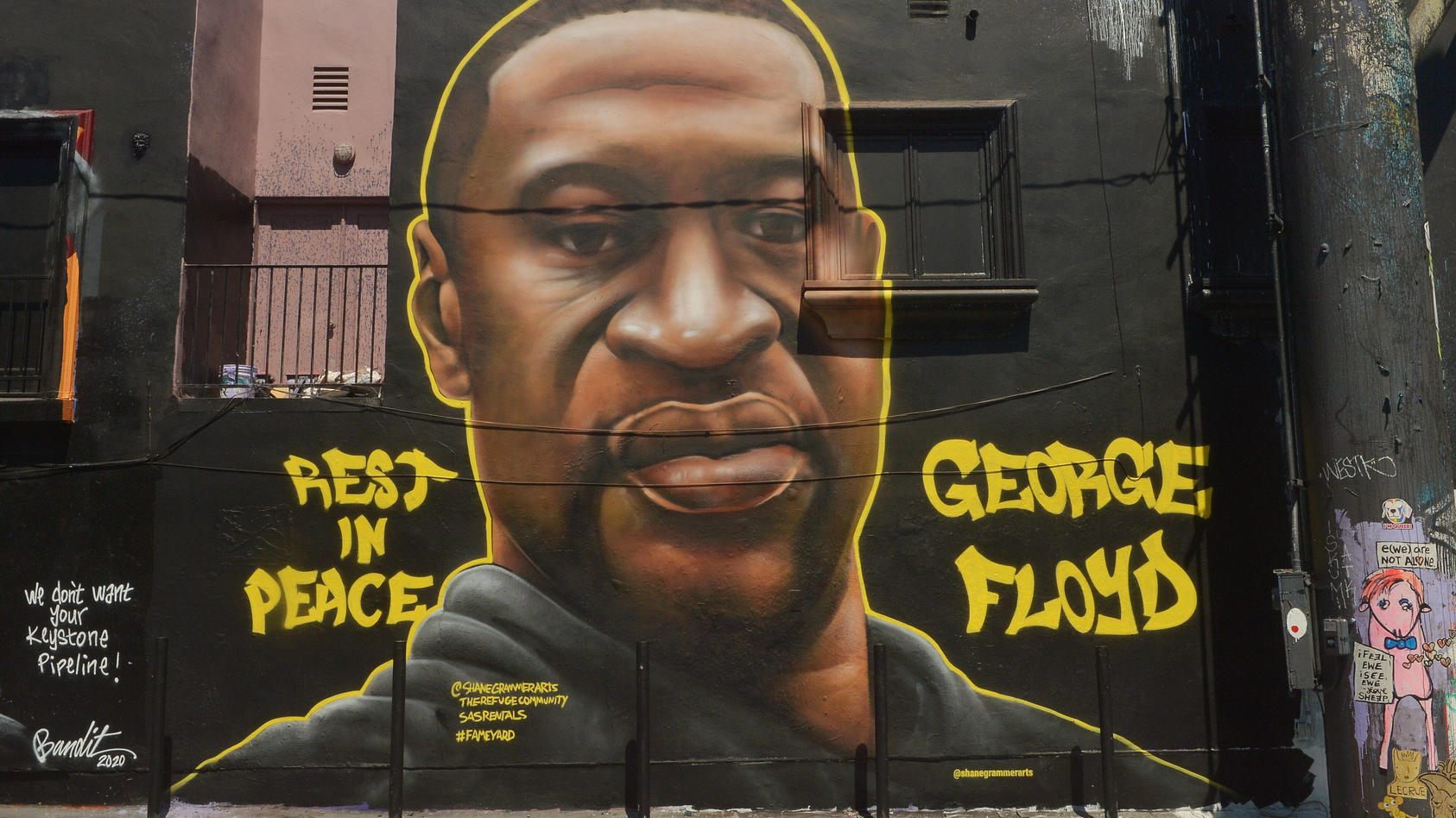 A mural go George Floyd commemorates the killing of George Floyd on Melrose Avenue in Los Angeles on Friday, June 12, 2