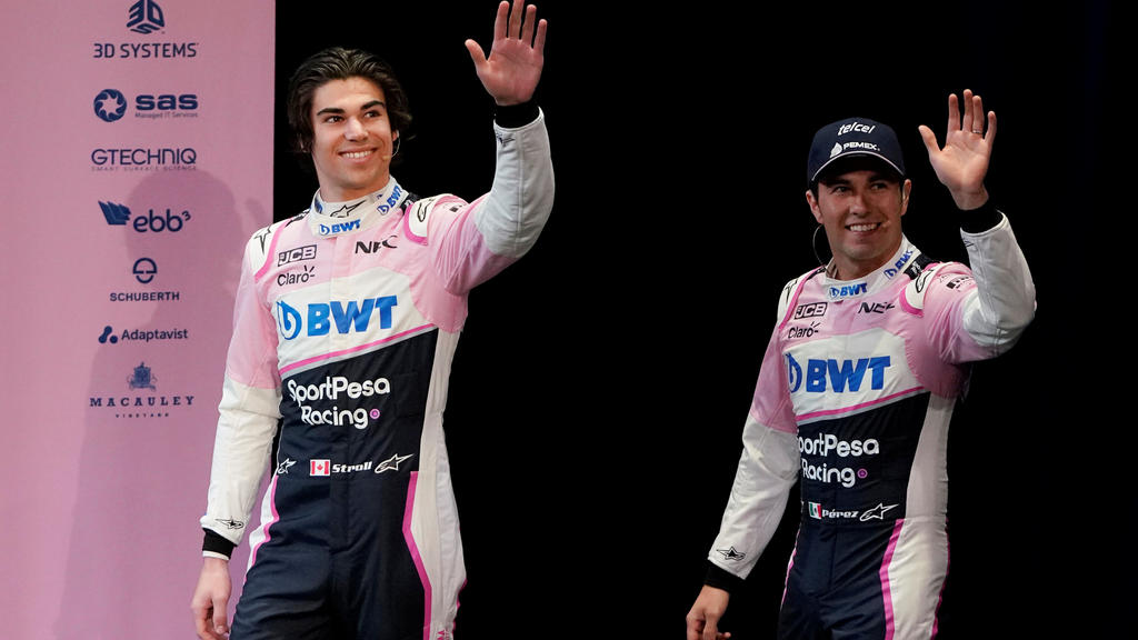 SportPesa Racing Point F1 Team drivers Sergio Perez and Lance Stroll arrive to unveil their team's new car livery at a pre-season launch event at the Canadian International AutoShow in Toronto, Ontario, Canada, February 13, 2019. REUTERS/Mark Blinch
