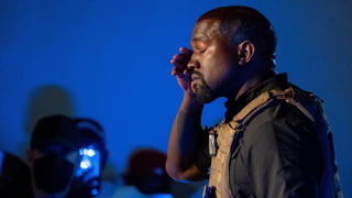  American rapper and entrepreneur Kanye West, wearing a bulletproof vest, wipes away tears during his first campaign event in the upcoming presidential election, Sunday, July 19 2020, in North Charleston, South Carolina. Kanye told the crowd that his wife Kim Kardashian almost aborted their first child, everyone that has a baby should get a million dollars and that marijuana should be free. PUBLICATIONxINxGERxSUIxAUTxHUNxONLY CHS20200719205 RICHARDxELLIS