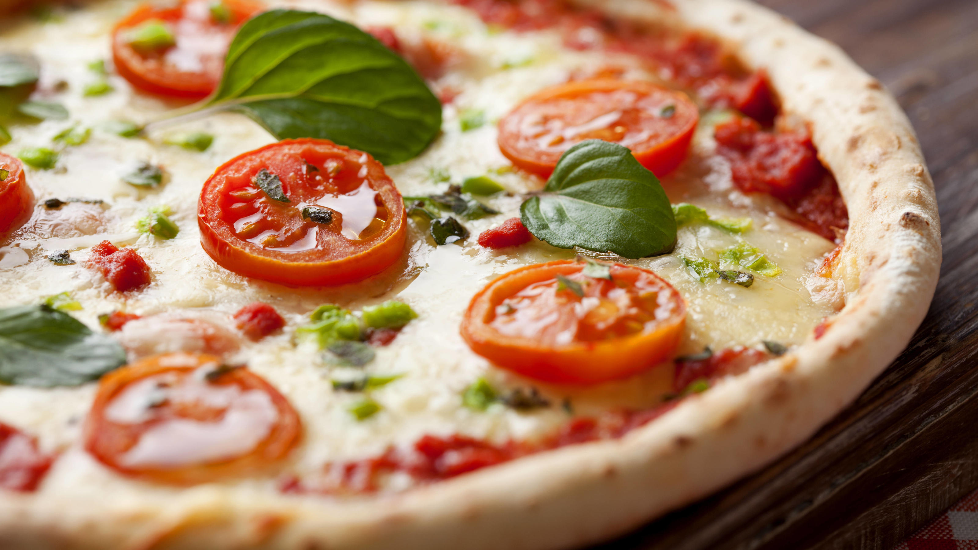 Delicious pizza, topped with fresh ingredients and cheese, is one of the classics in the children's kitchen.