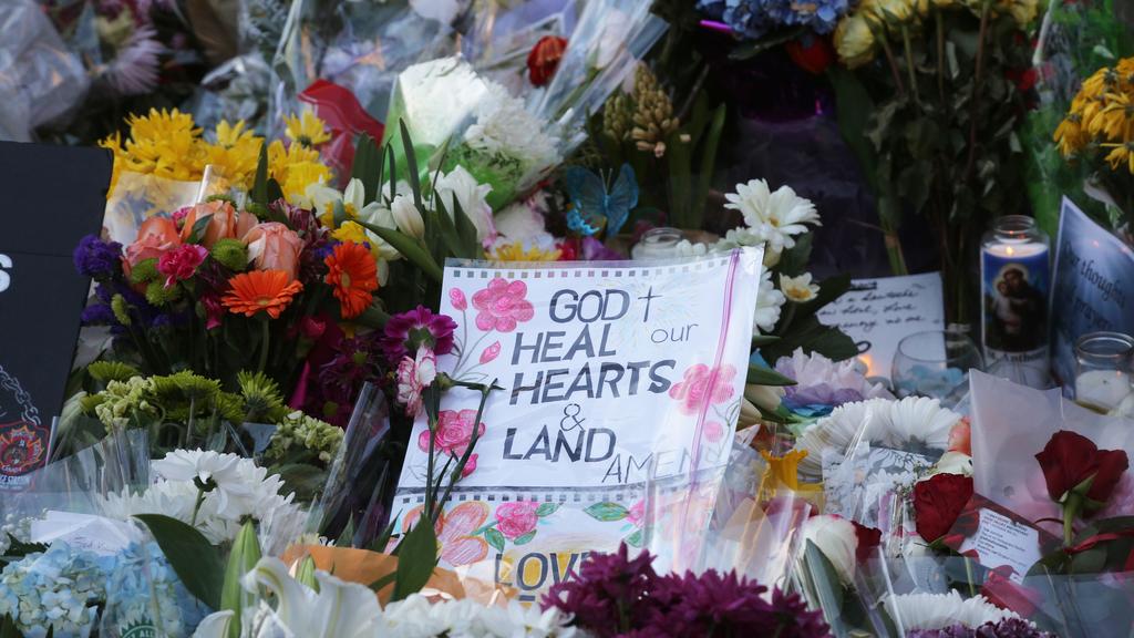 Flowers and messages at a memorial during an inter-faith vigil at Nathan Phillips Square in memory of the 10 people killed and 15 people injured in a deadly van attack in Toronto, Ontario, Canada, on 29 April 2018. Alek Minassian is identified as the