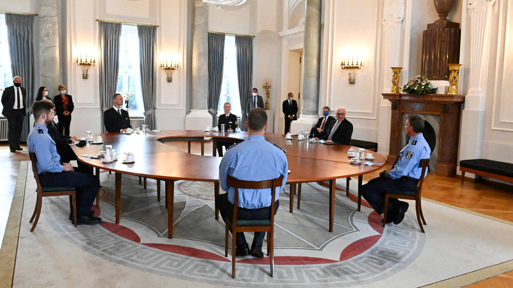 German President Frank-Walter Steinmeier receives German police officers who were on duty on August 29, 2020 during demonstrations at the Reichstag building, at the presidential Bellevue palace in Berlin, Germany August 31, 2020. Tobias Schwarz/Pool