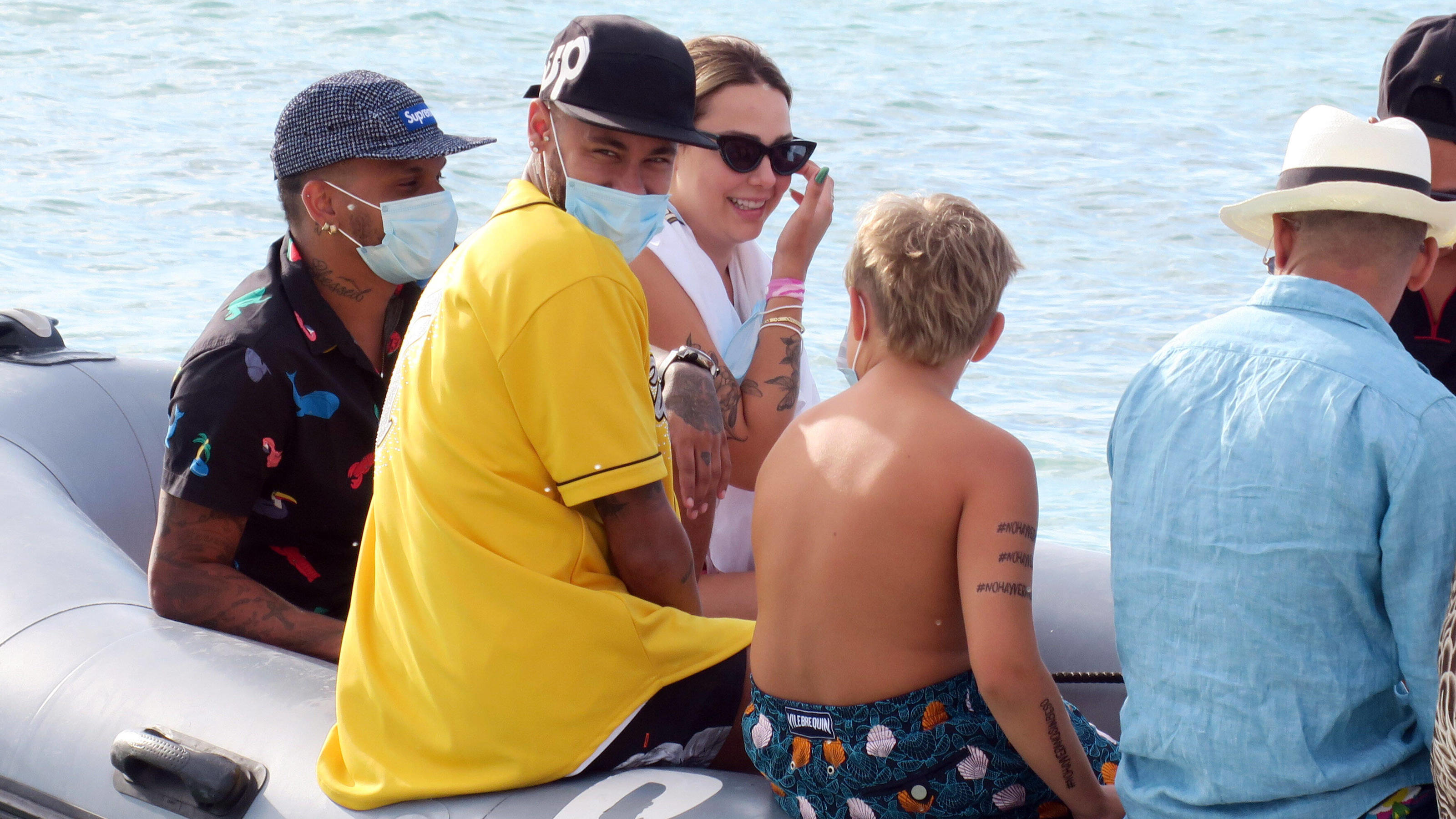 Formentera, Spain.Neymar relaxes on the boat with a group of friends, but it is when he goes down to the beach that he transforms into a protective father hugging his son Davi Lucca in the moment of the assault of the fans. PUBLICATIONxINxGERxAUTxONL