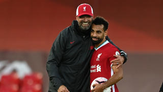 LIVERPOOL, ENGLAND - SEPTEMBER 12: Jurgen Klopp, Manager of Liverpool and Mohamed Salah of Liverpool celebrate following their team's victory in the Premier League match between Liverpool and Leeds United at Anfield on September 12, 2020 in Liverpool, England. (Photo by Shaun Botterill/Getty Images)
