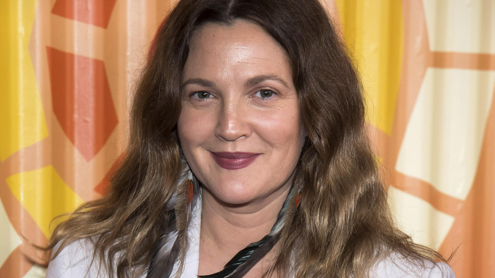 FILE - Drew Barrymore attends The Charlize Theron Africa Outreach Project fundraiser on Nov. 12, 2019, in New York. Barrymore's first show on Monday, Sept. 13, 2020, distributed by the CBS television studio, features former "Charlie's Angels" co-star