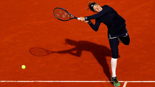 PARIS, FRANCE - OCTOBER 07: Laura Siegemund of Germany plays a backhand during her Women's Singles quarterfinals match against Petra Kvitova of Czech Republic on day eleven of the 2020 French Open at Roland Garros on October 07, 2020 in Paris, France. (Photo by Julian Finney/Getty Images)