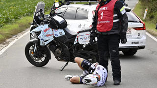  French Julian Alaphilippe of Deceuninck - Quick-Step lies injured on the ground during the Ronde van Vlaanderen - Tour des Flandres - Tour of Flanders one day cycling race, 241 km from Antwerp to Oudenaarde, Sunday 18 October 2020. DIRKxWAEM PUBLICATIONxINxGERxSUIxAUTxONLY x2566221x