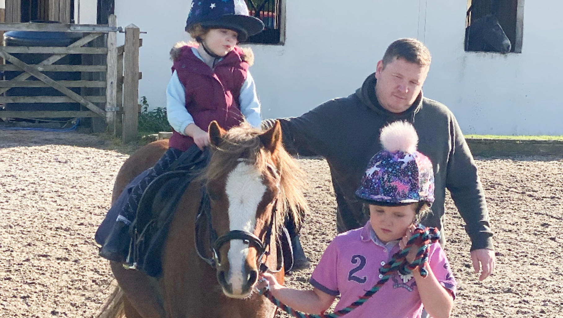 CATERS - (PICTURED: Crystal, 8, and Hallie, 3, at horse riding school).Meet the couple who are happy to label themselves Britain's pushiest parents - who say they'll stop at nothing to see their kids succeed. Sophie and Phil McGennity are determined