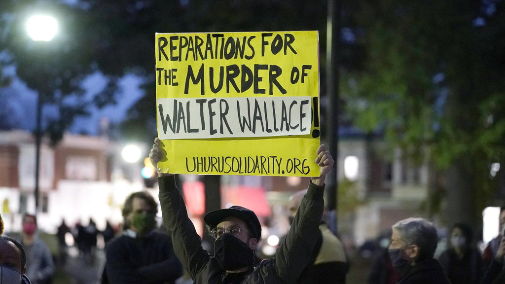 Protesters gather for a march Tuesday Oct. 27, 2020, in Philadelphia. Hundreds of demonstrators marched in West Philadelphia over the death of Walter Wallace, a Black man who was killed by police in Philadelphia on Monday. Police shot and killed the