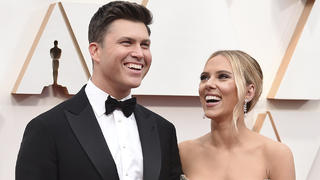 FILE - In this Feb. 9, 2020 file photo, Colin Jost, left, and Scarlett Johansson arrive at the Oscars in Los Angeles.  Meals on Wheels America announced Thursday on Instagram that Johansson and Jost married over the weekend in an intimate ceremony. (Photo by Jordan Strauss/Invision/AP, File)
