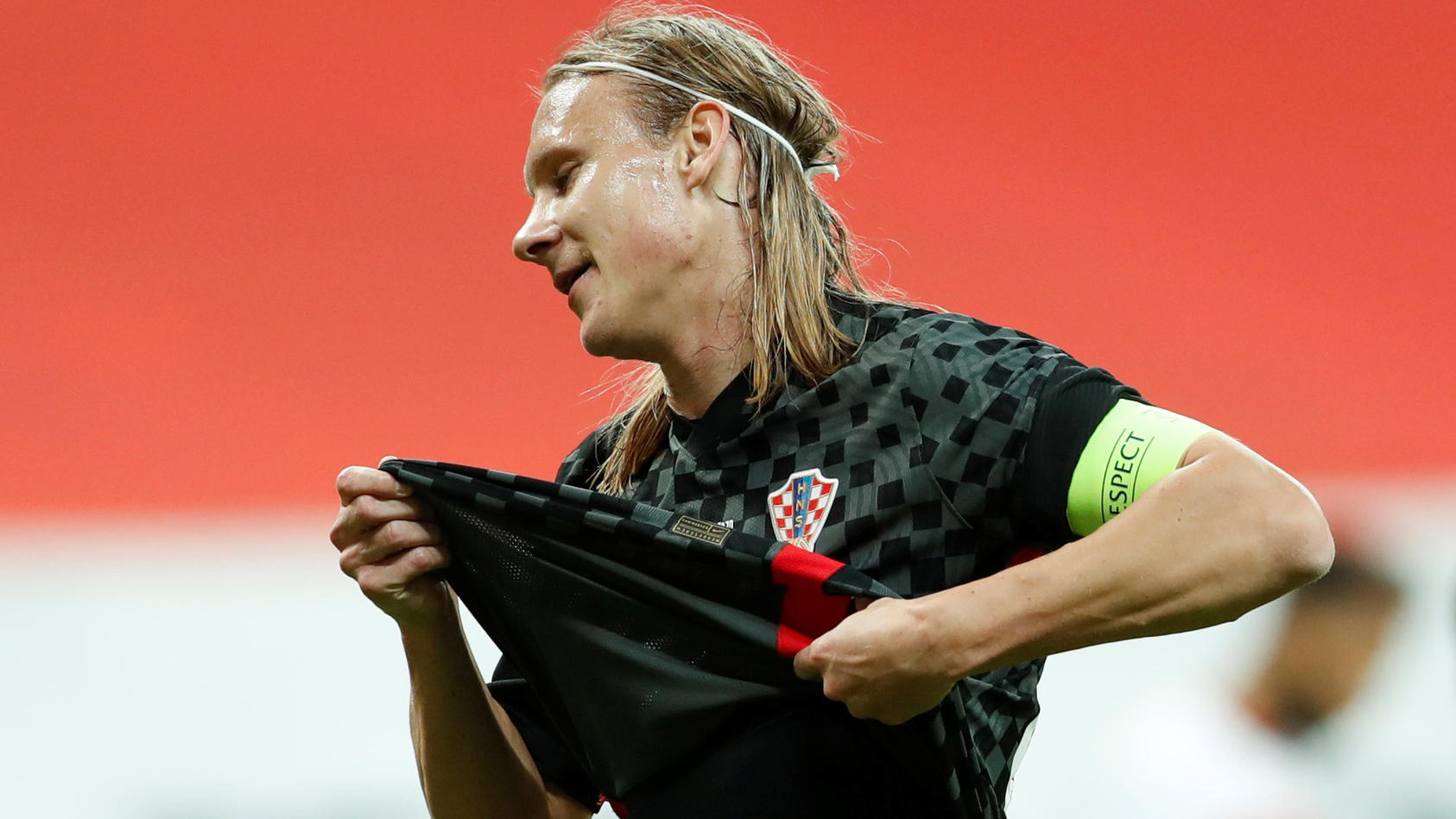 FILE PHOTO: Croatia's Domagoj Vida reacts after giving away a penalty in in the first half of an international friendly against Turkey before being substituted after Croatia management received news he had tested positive for COVID-19. Vodafone Park,
