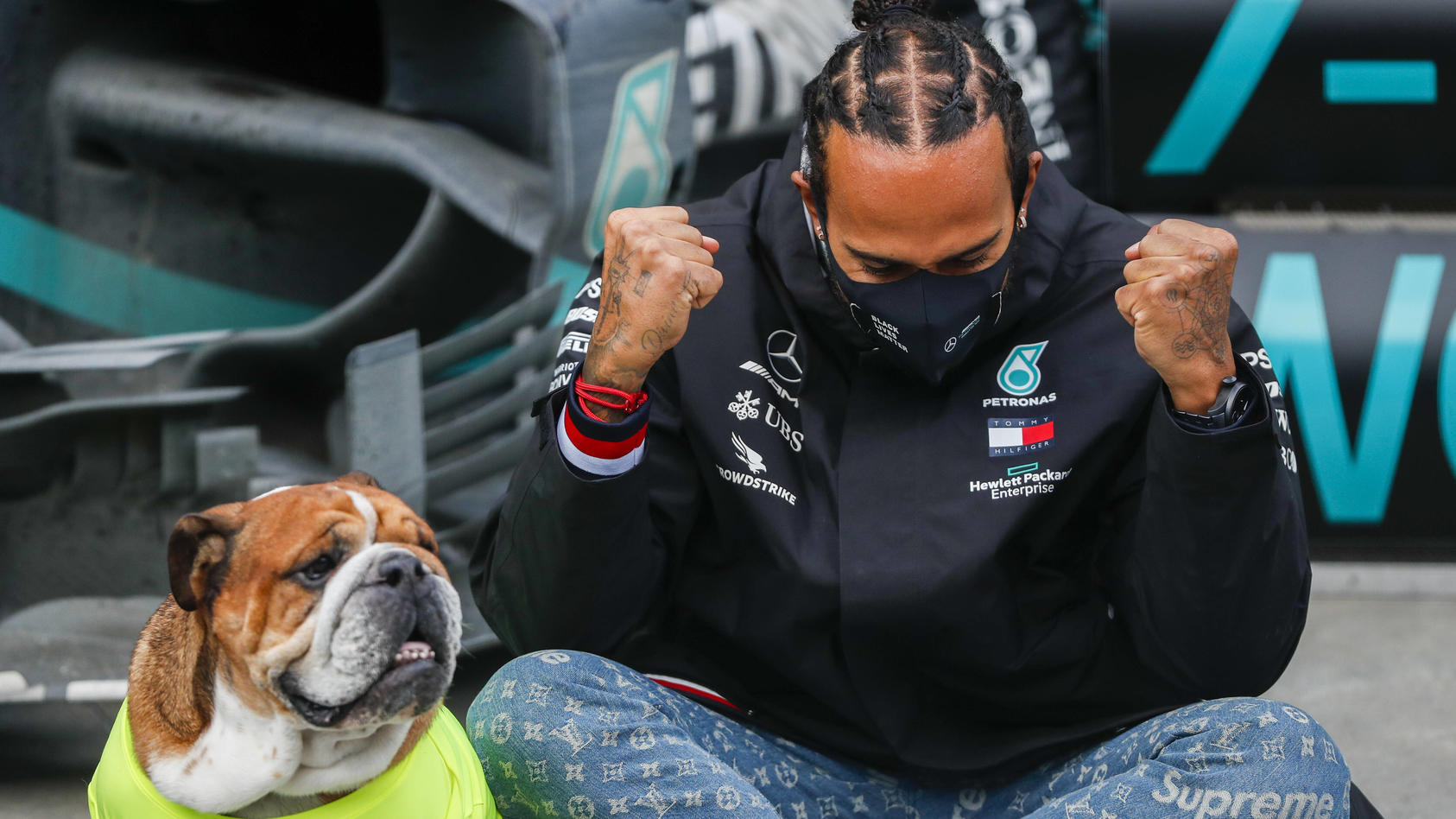  2020 Turkish GP ISTANBUL PARK, TURKEY - NOVEMBER 15: Lewis Hamilton, Mercedes-AMG Petronas F1, 1st position, his dog Roscoe, and the Mercedes team celebrate after having secured a seventh world drivers championship title during the Turkish GP at Ist