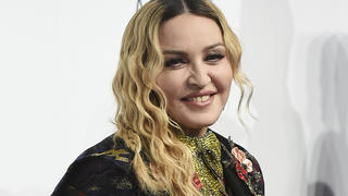 FILE - In this Dec. 9, 2016 file photo, Madonna attends the 11th Annual Billboard Women in Music honors in New York. Madonna will direct a biopic about herself for Universal Pictures. Madonna will direct and co-write with â€œJunoâ€ screenwriter Diablo Cody. (Photo by Evan Agostini/Invision/AP, File)