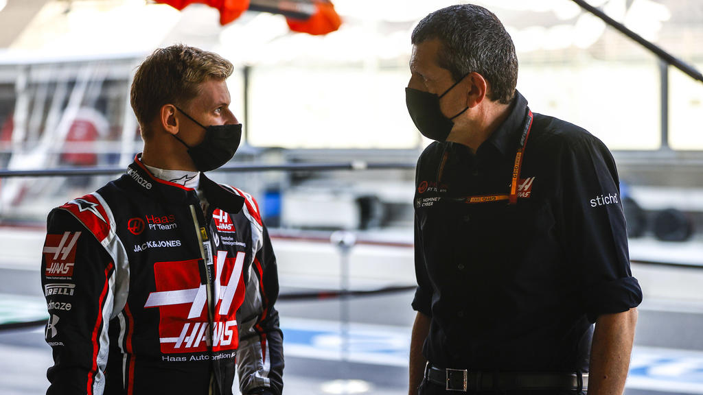 2020 Abu Dhabi GP YAS MARINA CIRCUIT, UNITED ARAB EMIRATES - DECEMBER 10: Mick Schumacher, Haas F1, with Guenther Steiner, Team Principal, Haas F1 during the Abu Dhabi GP at Yas Marina Circuit on Thursday December 10, 2020 in Abu Dhabi, United Arab