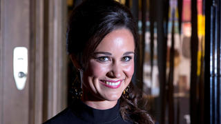 FILE PHOTO: Pippa Middleton, sister of Catherine, Duchess of Cambridge, poses for photographers to promote her first book "Celebrate", on the subject of party planning, in London October 25, 2012. REUTERS/Neil Hall/File Photo