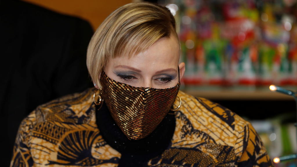 Princess Charlene of Monaco, wearing a protective face mask, attends the traditional Christmas tree ceremony at the Monaco Palace, as part of Christmas holiday season in Monaco, December 16, 2020. REUTERS/Eric Gaillard/Pool