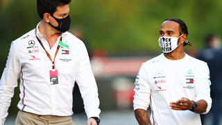 IMOLA, ITALY - OCTOBER 30: Lewis Hamilton of Great Britain and Mercedes GP and Mercedes GP Executive Director Toto Wolff walk in the Paddock during previews ahead of the F1 Grand Prix of Emilia Romagna at Autodromo Enzo e Dino Ferrari on October 30, 2020 in Imola, Italy. (Photo by Mark Thompson/Getty Images)