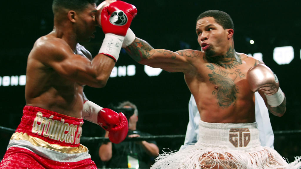 FILE - In this Dec. 29, 2019, file photo, Gervonta Davis, right, lands a punch on Yuriorkis Gamboa during round eight in their WBA lightweight bout in Atlanta. Davis wants to become a pay-per-view star, much like his promoter and mentor Floyd Mayweat