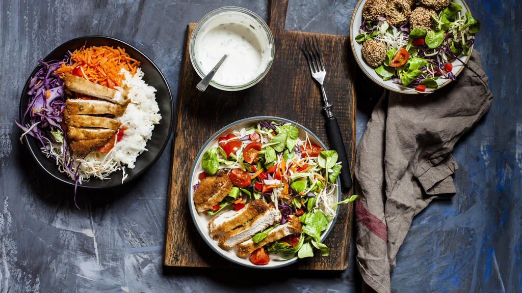 Bowls with three different ready-to-eat salads SBDF04236