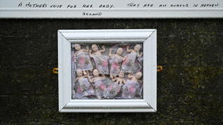 A detail view of the Tuam graveyard, where the bodies of 796 babies were uncovered at the site of a former Catholic home for unmarried mothers and their children on the day a government-ordered inquiry into former Church-run homes for unmarried mothers is formally published, in Tuam, Ireland, January 12, 2021. REUTERS/Clodagh Kilcoyne     TPX IMAGES OF THE DAY